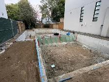 Concrete footing and foundation wall - Photo 10