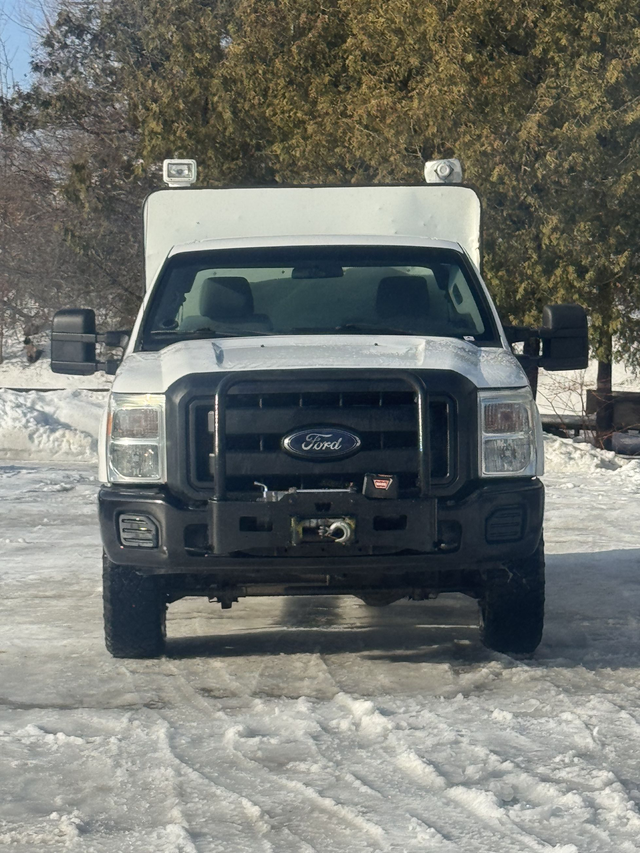2015 Ford Super Duty F-250 SRW 4x4 with high roof cap — CERTIFIE
