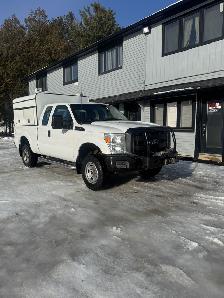 2015 Ford Super Duty F-250 SRW 4x4 with high roof cap — CERTIFIE - Photo 2