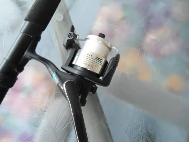 TWO AS NEW ICE FISHING ROD AND REELS - Photo 2