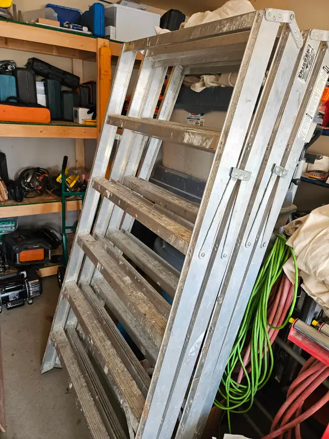 2 Aluminum 6-step folding sawhorses. $ 140 each.