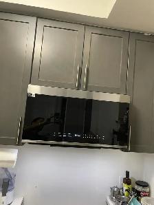 Over the range microwave installation