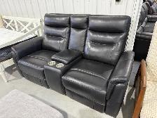 Black leather power reclining loveseat with console