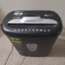 Black Amazon Basics paper shredder for home and office with 8 Sh