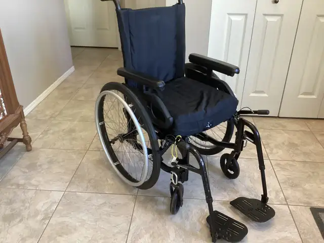 Motion Composites Wheel Chair