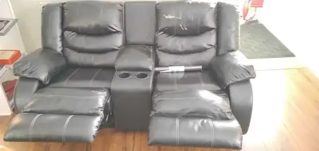 FREE Faux Leather Reclying Loveseat - Photo 2