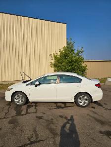 Honda Civic LX 2013 for sale with 2 sets of tires on rims