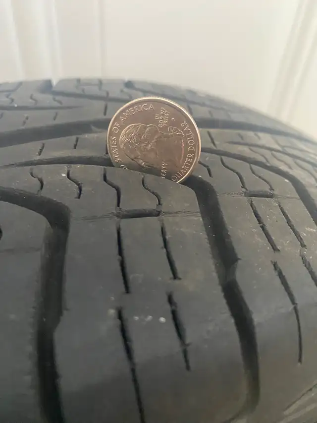 One P185/60R15 ALL SEASON RADIAL TIRE