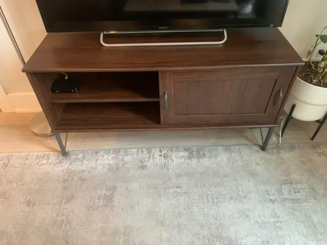 Solid Dark Wood TV Stand in Very Good Condition - Photo 2