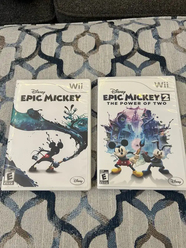 Epic Mickey 1& 2 games & strategy guides for Nintendo Wii