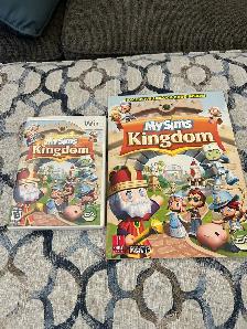 My Sims Kingdom game & guide book for Nintendo Wii