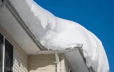 shovelling snow off roofs