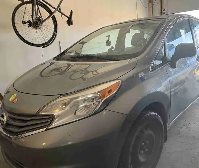 2014 Nissan versa note SL ( rebuilt )