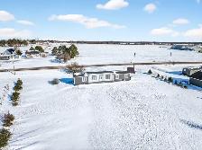 Affordable 3 Bedroom 2 Bath on .85 acre lot.