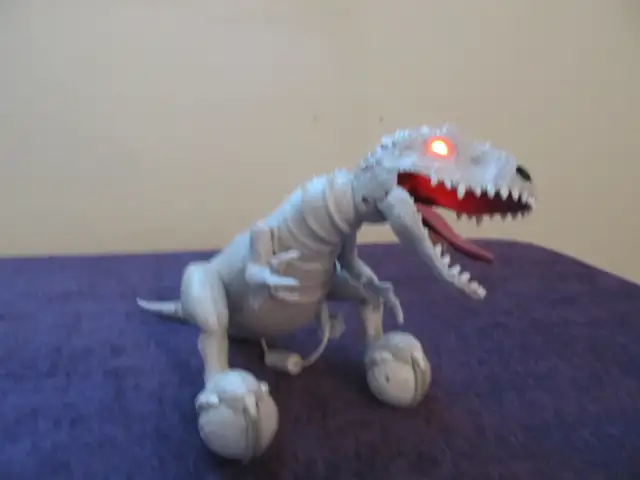 DINOSAUR  T. REX ( PRE-PROGRAMED TOY )