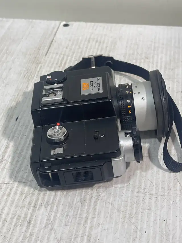 Minolta 110 Zoom SLR - Photo 9