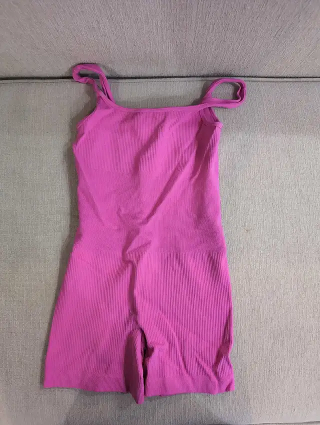 one piece pink active suit