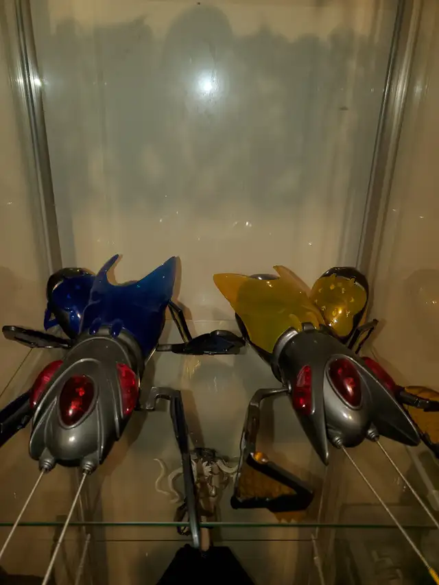 2 Glass Stands with Mcfarlanes toys More $40$ for everything