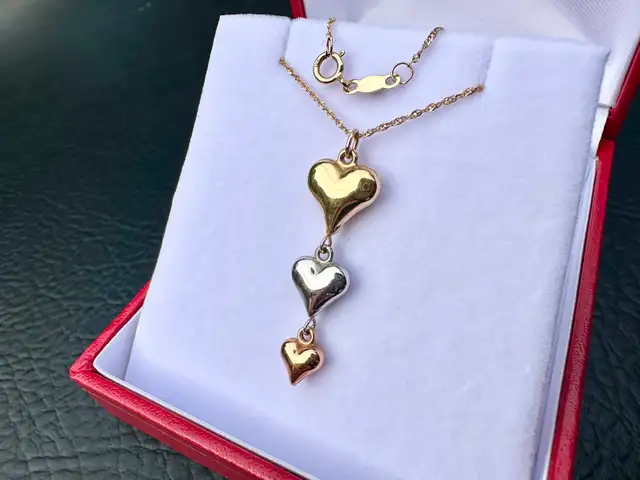 #764 - Triple Heart Linear Drop Pendant in 10K Tri-Tone Gold 18"