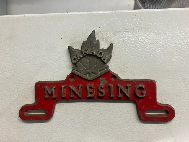 antique license plate holder