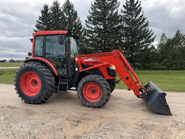 KIOTI DK90 CAB TRACTOR WITH LOADER AND BUCKET FOR RENT