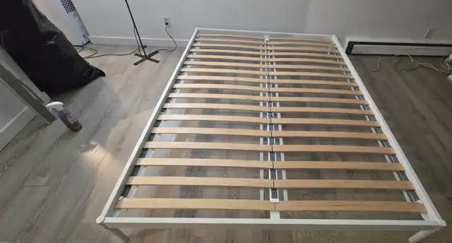 Queen bed frame.  Brand new!! Motivated to sell/move ASAP!