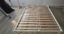 Queen bed frame.  Brand new!! Motivated to sell/move ASAP!
