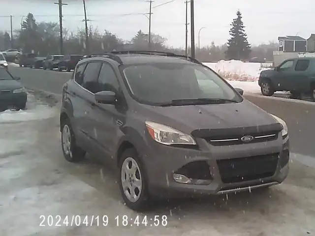 2014 Ford Escape AWD  (low klms)