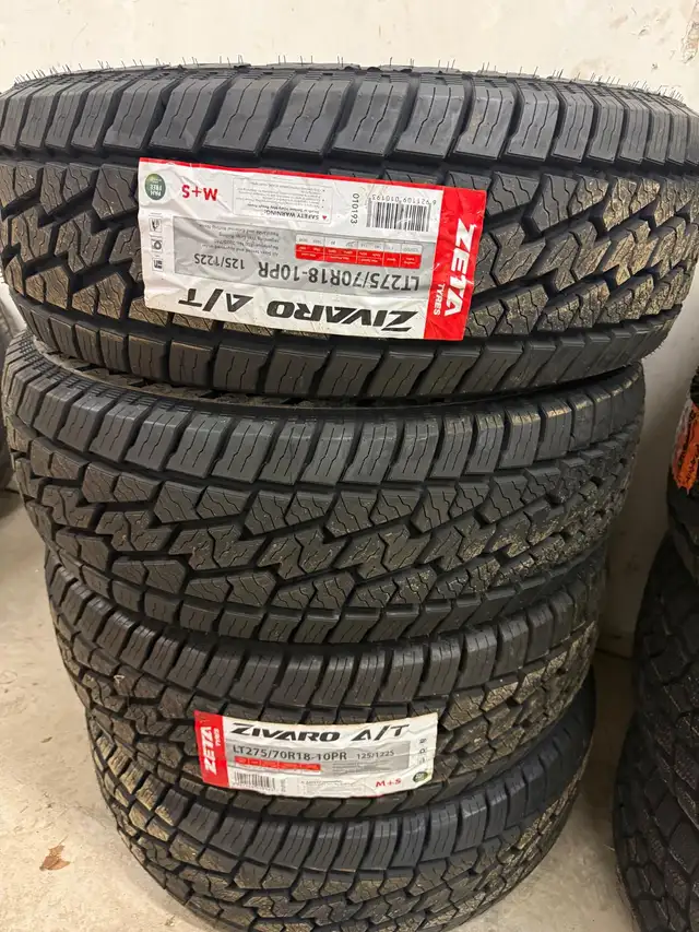 LT 275 70 18 - A/T Tires Set