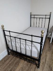 Twin Metal Bed Frame with Wooden Slats and Mattress - $150