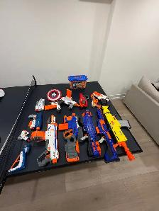 Nerf  toys and box of darts