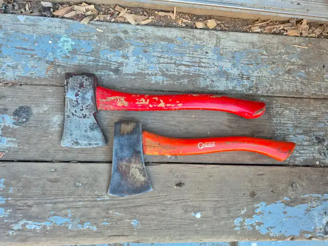 Pair of vintage Canadian hatchets on original handles