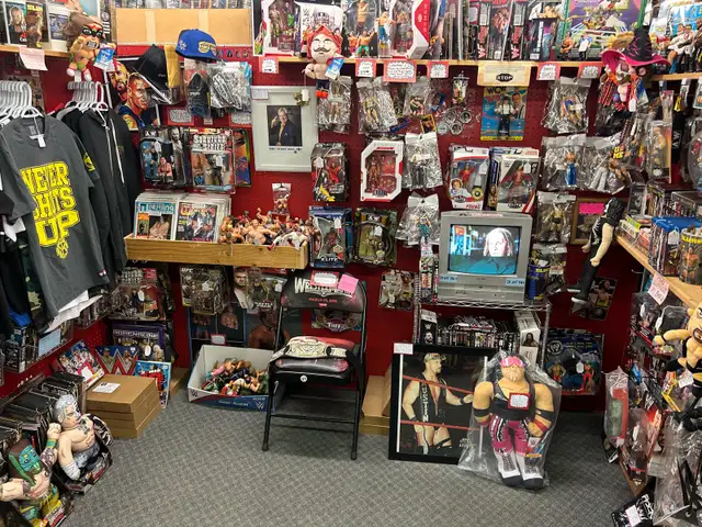 Booth 276 WWE Wrestling Merch Figures Magazines DVDs LJN AEW