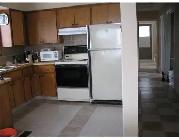 Room for rent in quiet triplex. Close to bus route, plaza
