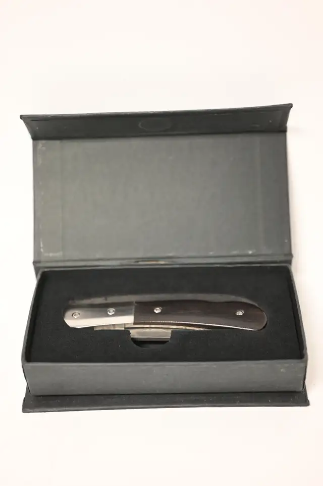 Damascus pocket knife with box USED in good condition