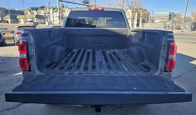 This Pickup powered by a Gasoline engine featuring 4WD/4-Wheel D - Photo 6