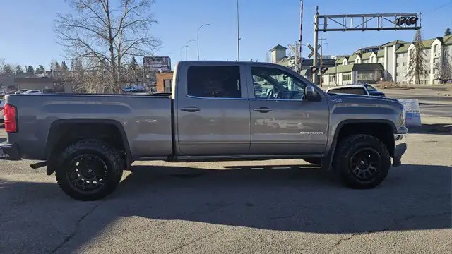 This Pickup powered by a Gasoline engine featuring 4WD/4-Wheel D - Photo 8