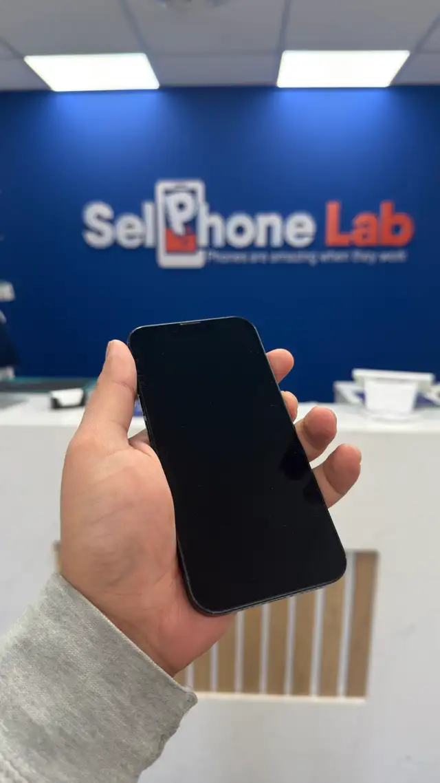 iPhone 13(pre owned) sale at SellPhone Lab Cochrane with war - Photo 2