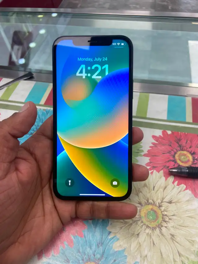 Preowned iPhone 12 PROMAX (256GB)only for$699 with 1YR warranty - Photo 3