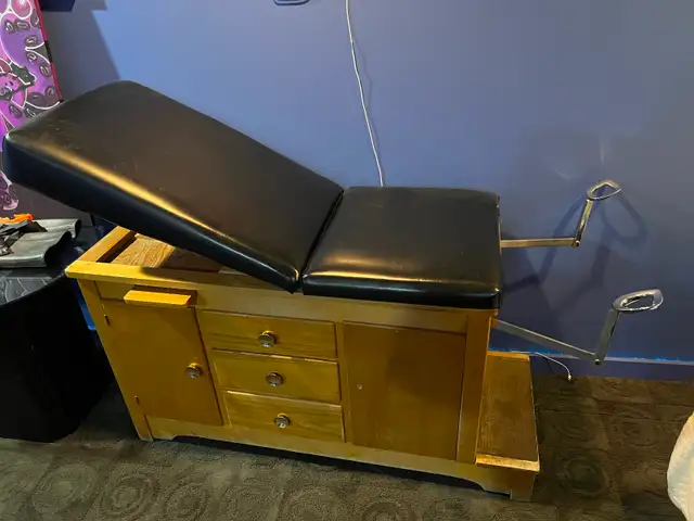 Antique medical exam table, unique piece of funtiture.