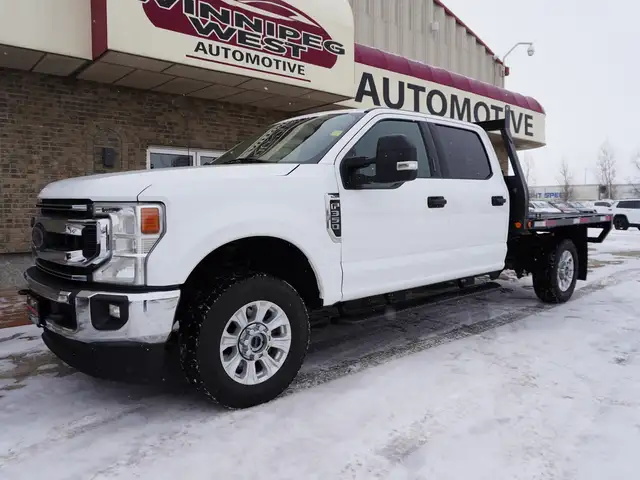 2022 Ford F-350 XLT 4WD Crew Cab | HEAVY DUTY FLAT DECK!! - Photo 2