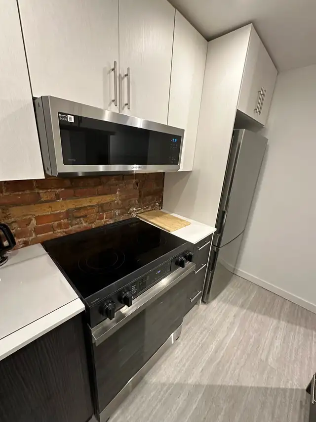 Downtown 3 Bedrooms with 5 Beds - Photo 4