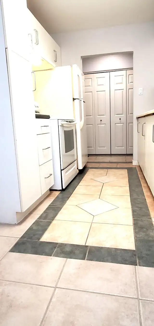 STUNNING 2 Bedroom with Scenic Balcony - Near Fairview Mall - Photo 2