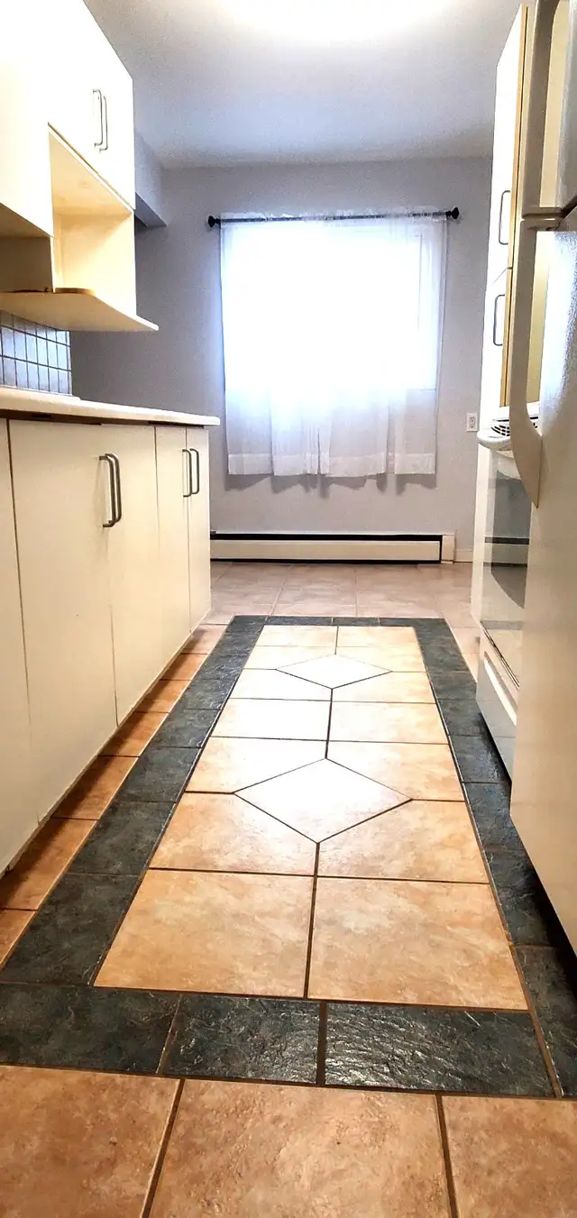 STUNNING 2 Bedroom with Scenic Balcony - Near Fairview Mall - Photo 3