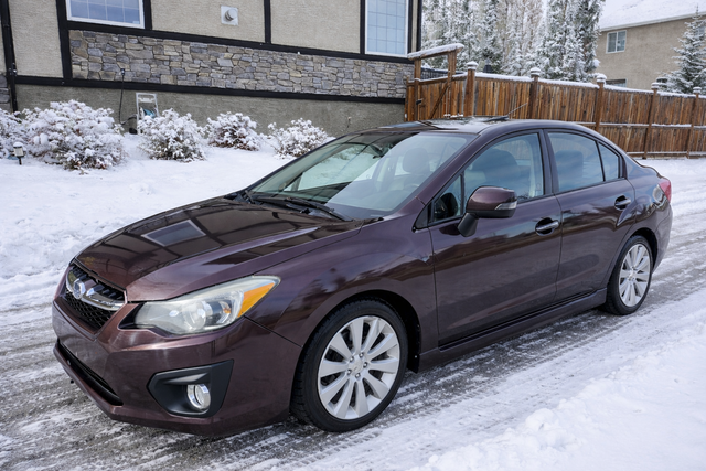 2012 Subaru Impreza 2.0 liter AWD looks like Civic Corolla Jetta