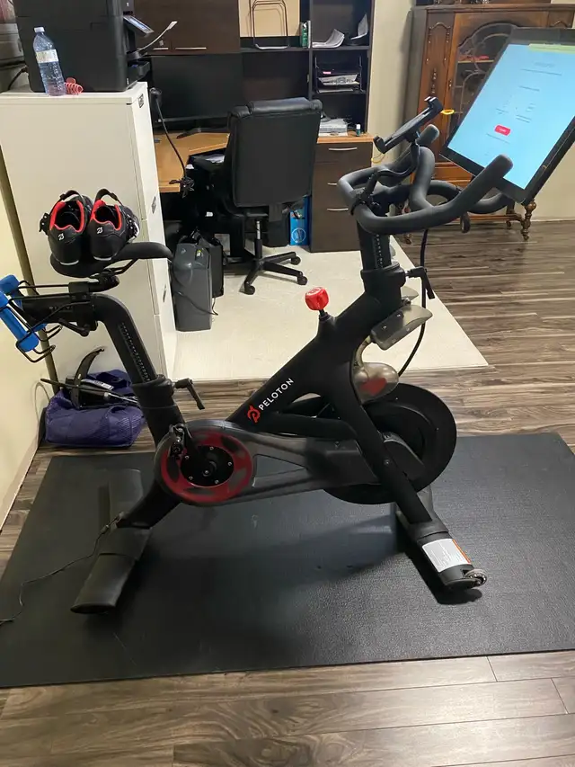 peleton bike with accessories - Photo 2