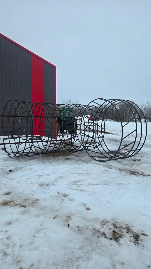 Round bale feeders