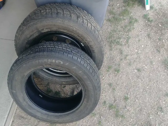 225/65R17 tire and 245/65R17 tire and rim