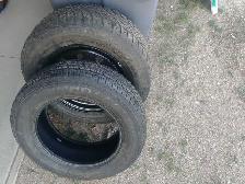 225/65R17 tire and 245/65R17 tire and rim