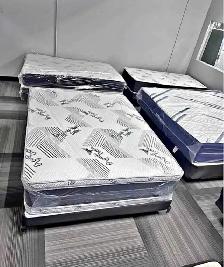 Double bed with mattress at discounted price.